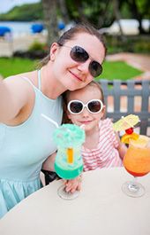 Young girl and her mother with mocktails